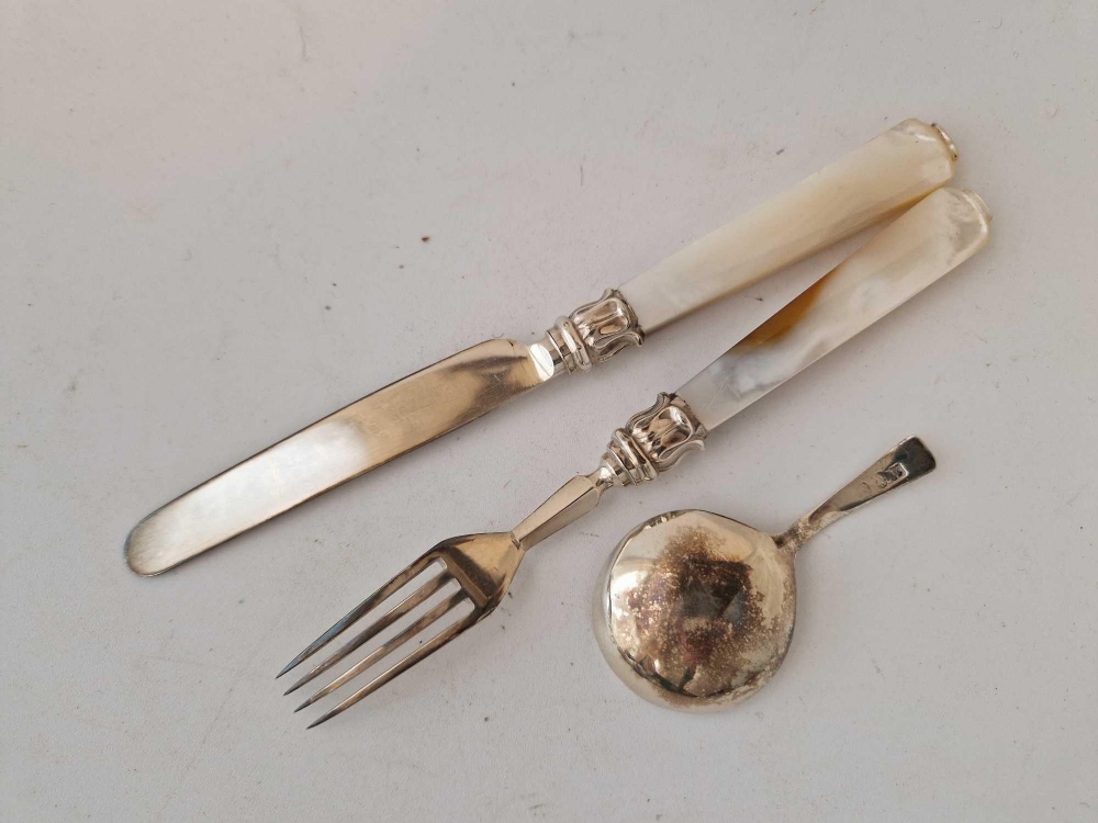 A Georgian M.O.P handled knife and fork, a caddy spoon with circular bowl - Image 2 of 2