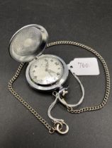 A unusual gents RUSSIAN metal pocket watch by MOLNIJA with marine picture to rear with metal