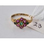 A Victorian emeralds and ruby daisy ring, 9ct, size M