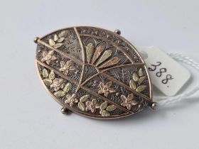 A Victorian silver and gold brooch