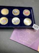 6 x Gold plated crown coins in box