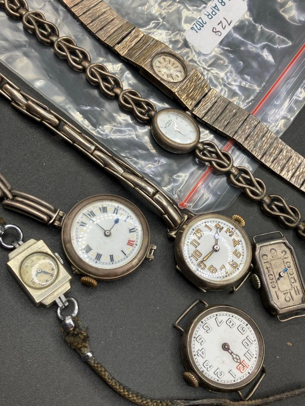 Seven assorted silver and metal wrist watches
