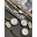 Seven assorted silver and metal wrist watches