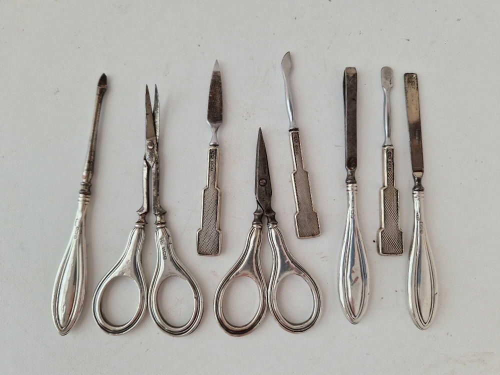 Eight various silver handled manicure items