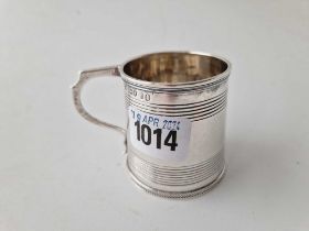 A small Georgian mug with two reeded bands, scroll handle, 2.5 inches high, London 1824 by JA, 97 g
