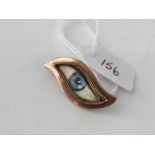 Antique gold mounted hand painted eye brooch