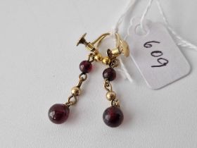 A pair of cabochon garnet screw back earrings