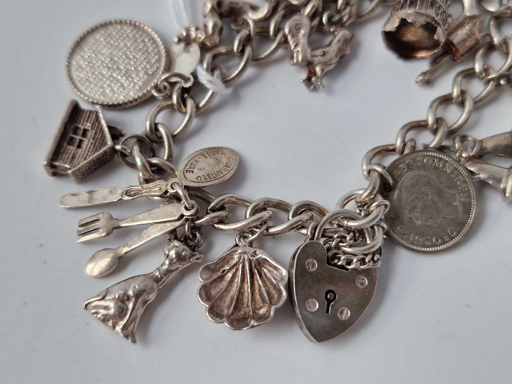 A silver charm bracelet with 16 silver charms 47.4g - Image 3 of 4