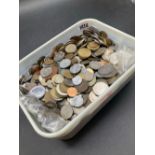 Heavy tub of world coins