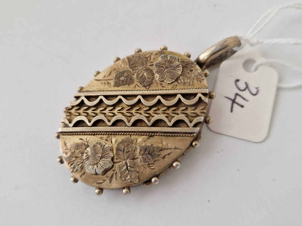 A Victorian silver gilt locket/ pendant, 15.3 g