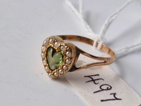 An antique gold and peridot heart ring, size R