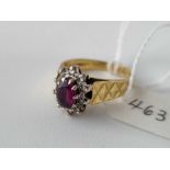 A oval cluster ring 18ct gold size L