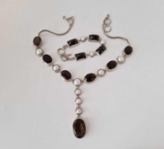 A stone set silver necklace and matching bracelet, 112 g inc