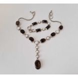 A stone set silver necklace and matching bracelet, 112 g inc