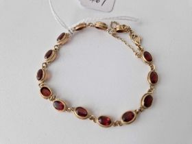 A gold and stone mounted bracelet 6 inch