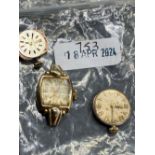 A ladies OMEGA wrist watch and two ladies OMEGA watch movements