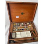 19thC paint box in an inlaid mahogany box with Landseer lable 11.5 wide