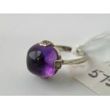 A white gold cabochon amethyst ring 9ct size K 3.5 gms