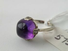 A white gold cabochon amethyst ring 9ct size K 3.5 gms