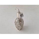 Chinese style overlay bitters bottle with glass body.4in high