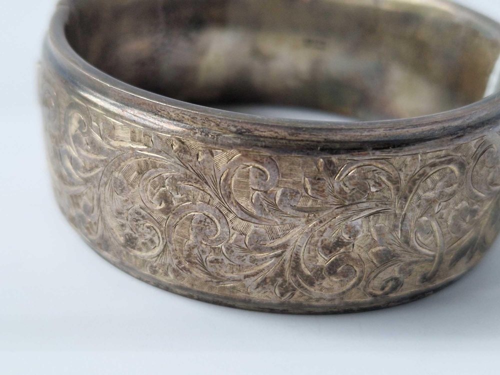 A silver hinged bangle, 44 g - Image 2 of 3