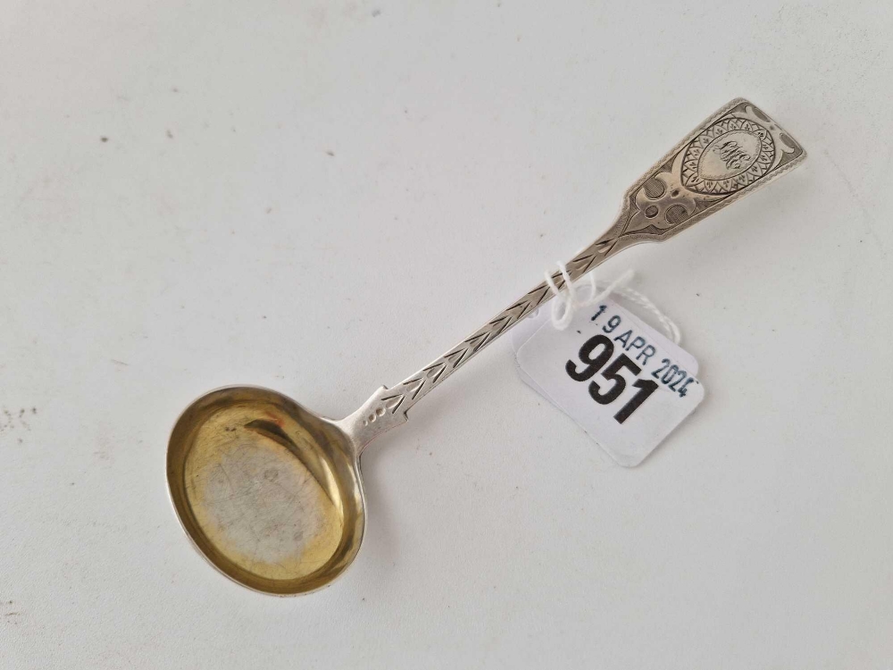 A Victorian Exeter cream ladle with strap work, 1879 by JW & Co