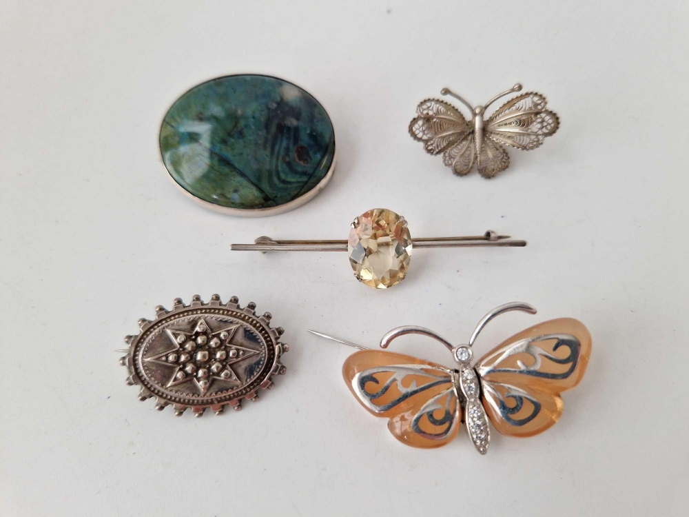 Five silver brooches, etc