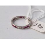 A WHITE GOLD DIAMOND AND RUBY ETERNITY RING, 18ct, size L