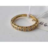 A diamond mounted ring 18ct gold size O 3.7 gms