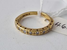 A diamond mounted ring 18ct gold size O 3.7 gms