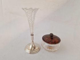 A Silver tortoise shell top jar and a vase with glass flower holder