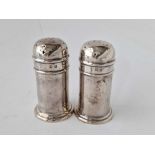 Pair of cylindrical peppers with dome covers. 2.5 in high . Birmingham 1922. 56 gm