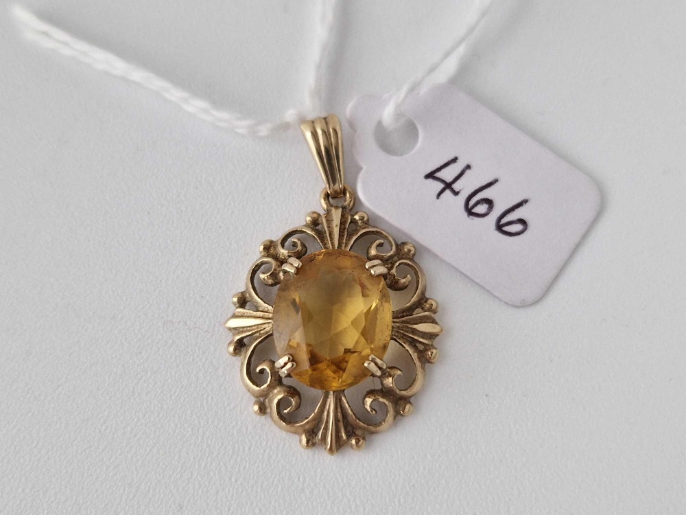 A gold mounted citrine pendant 9ct