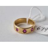 Gypsy set three stone ruby ring, 18ct, size M, 5.7 g Birmingham 1924