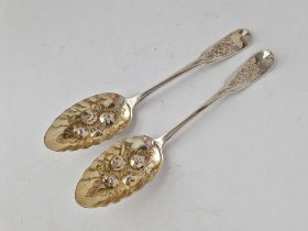 A pair of Georgian Scottish berry spoons with embossed gilt bowls, Edinburgh 1814 by DM, 131g