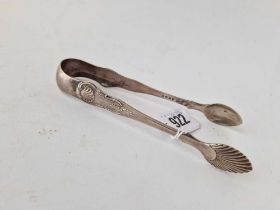 A pair of Victorian Scottish sugar tongs with shell decoration, Edinburgh 1864