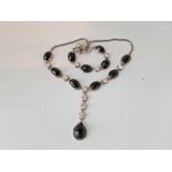 A stone set silver necklace and matching bracelet, 98 g inc