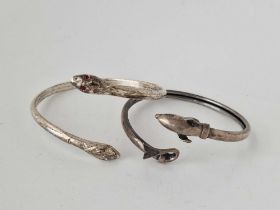 A snake and fish silver bangles