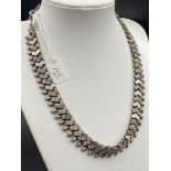 A silver collar necklace 64g