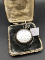 A gents silver pocket watch by KEMP Bros Bristol with seconds dial in original case