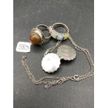 Two silver rings and locket on chain 21 g