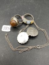 Two silver rings and locket on chain 21 g