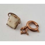 A Rose gold bolt ring and earrings top