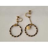 A pair of antique gold mounted circular earrings