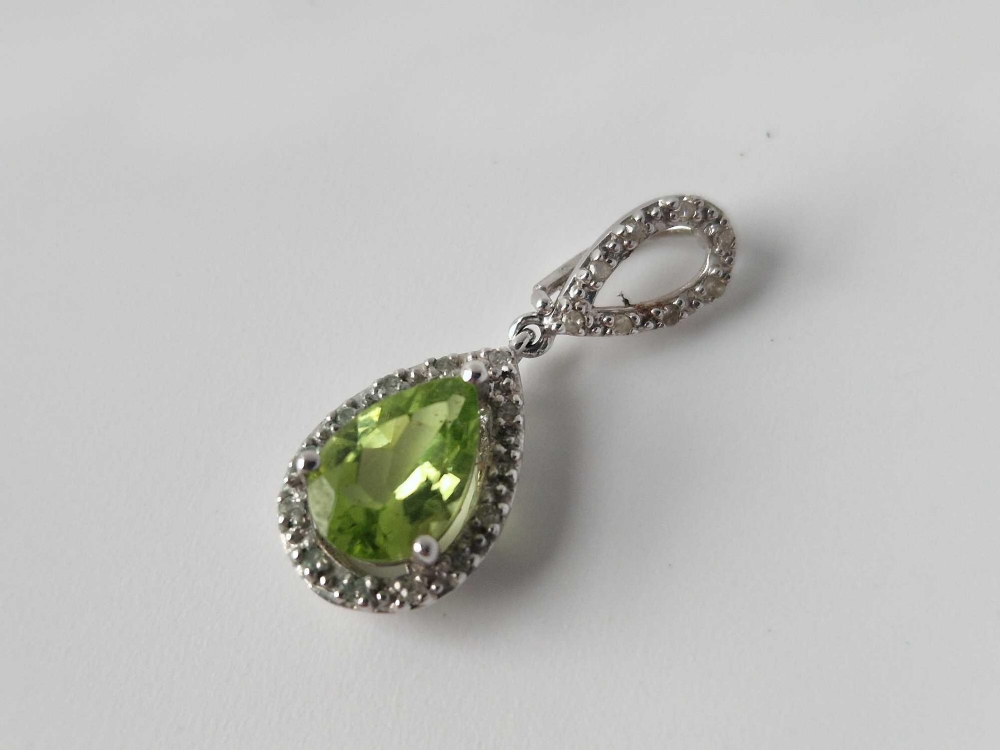 A pear shaped diamond & greenstone 9ct pendant1.5g