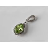 A pear shaped diamond & greenstone 9ct pendant1.5g