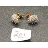 A pair of diamond cluster earrings 0.25ct