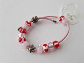 A silver and bead friendship bracelet