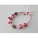 A silver and bead friendship bracelet