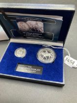 Cased 1887 shilling & 1977 silver proof crown